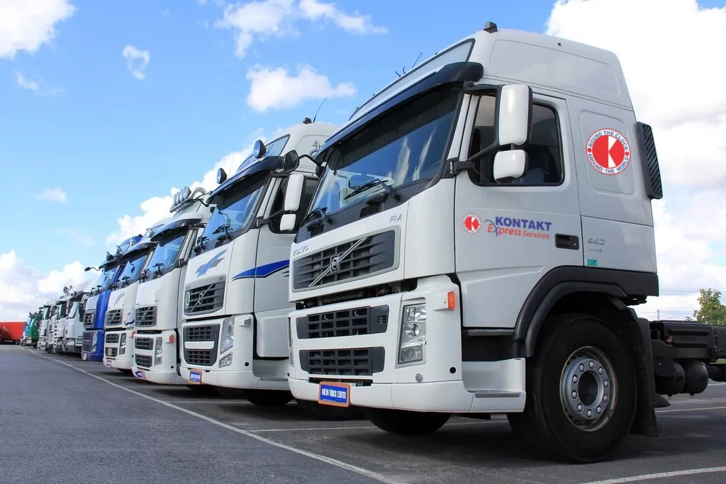 Kontakt Express Services branded truck at a truck depot